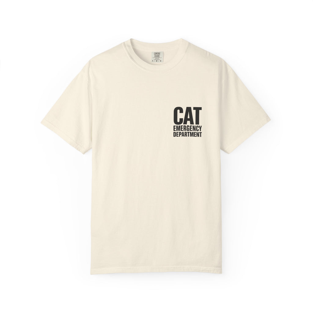 An off-white crewneck t-shirt with a black printed graphic on the left chest reading 'CAT EMERGENCY DEPARTMENT'.