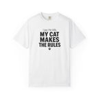 White t-shirt with a paw graphic and text on a white background