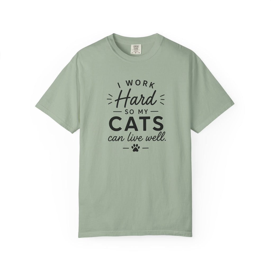 Green t-shirt with 'Adventure is a Better Investment' text and mountain graphic on a white background